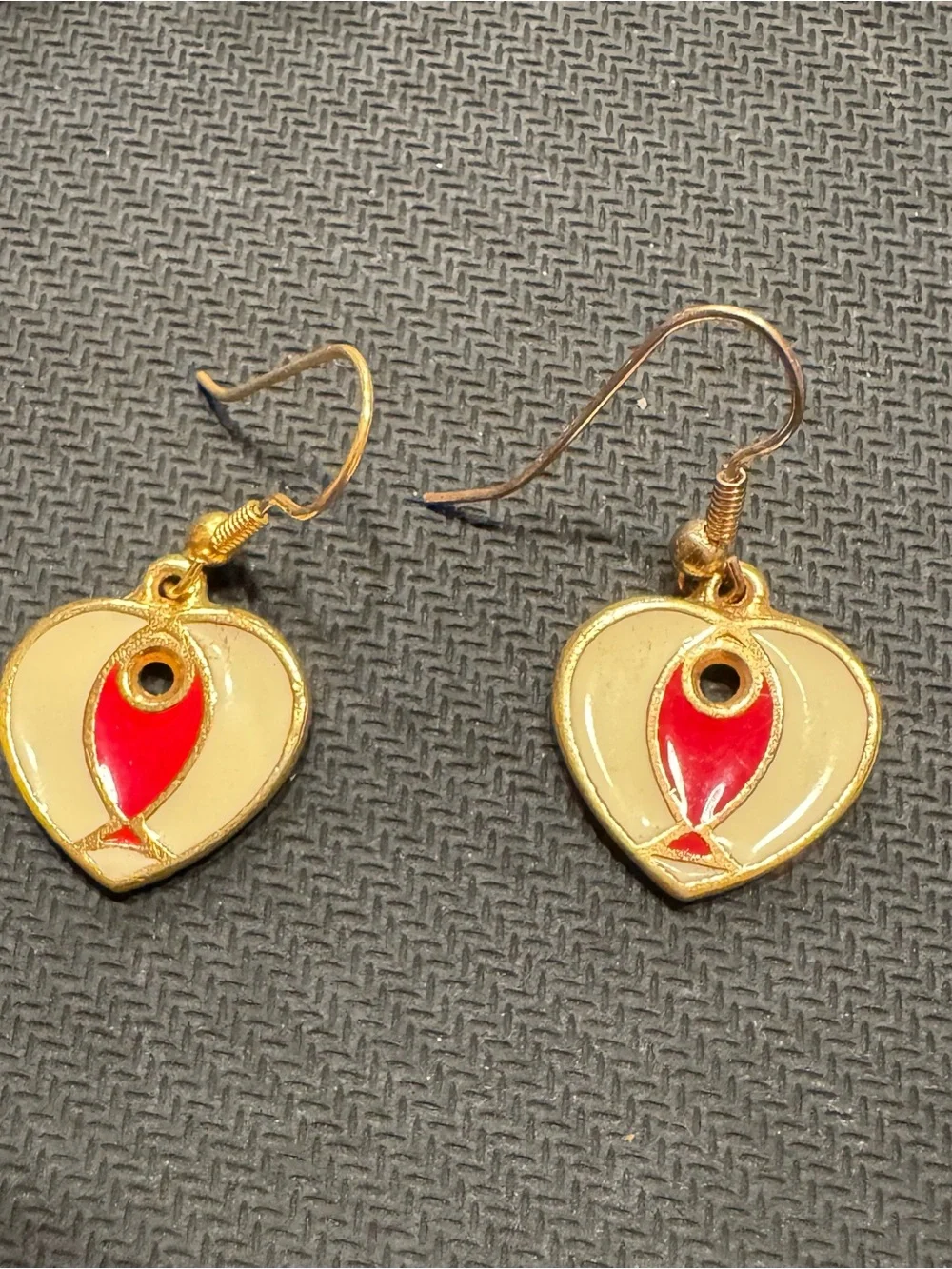 Gold Tone Enamel Hear Shaped Dangle Earrings With a Red Fish Motif In the middle